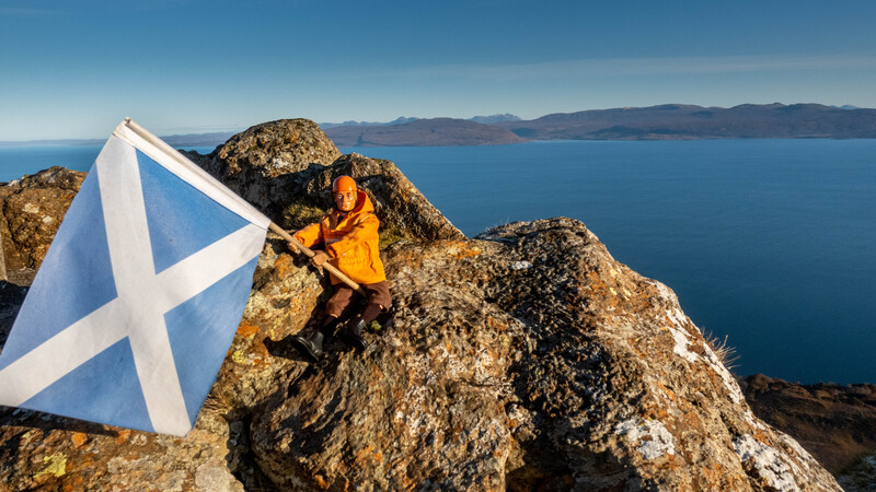 Dr. A.H.B. Man summits Dun Caan on the Isle of Raasay on a chilly St. Andrew's Day