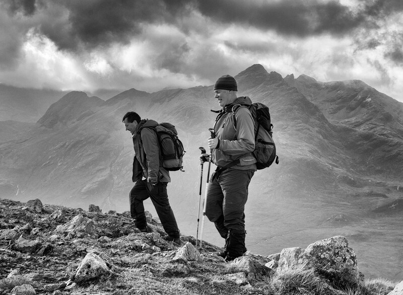 Red Cuillin mountaineers with the Black Cuillin behind